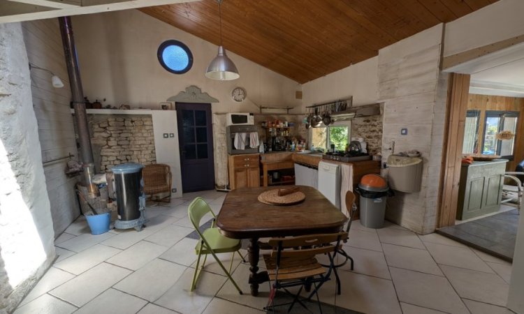 Achat d'une maison trois pièce avec jardin à Angliers